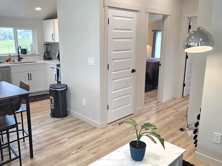 Kitchen includes a full size-dishwasher, garbage disposal, coffee maker, air-fryer, stove, and plenty of storage space.