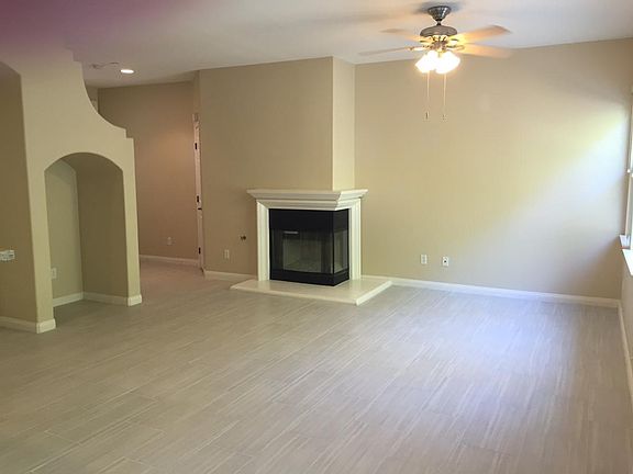 Living room with glass crystal fireplace