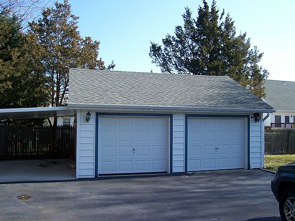 Detatched Double Garage Plus Car Port