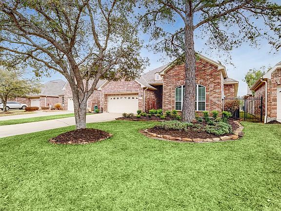 Large, mature trees add to the beauty of the neighborhood.