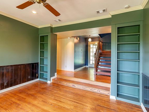 front entry in background, front, smaller living area