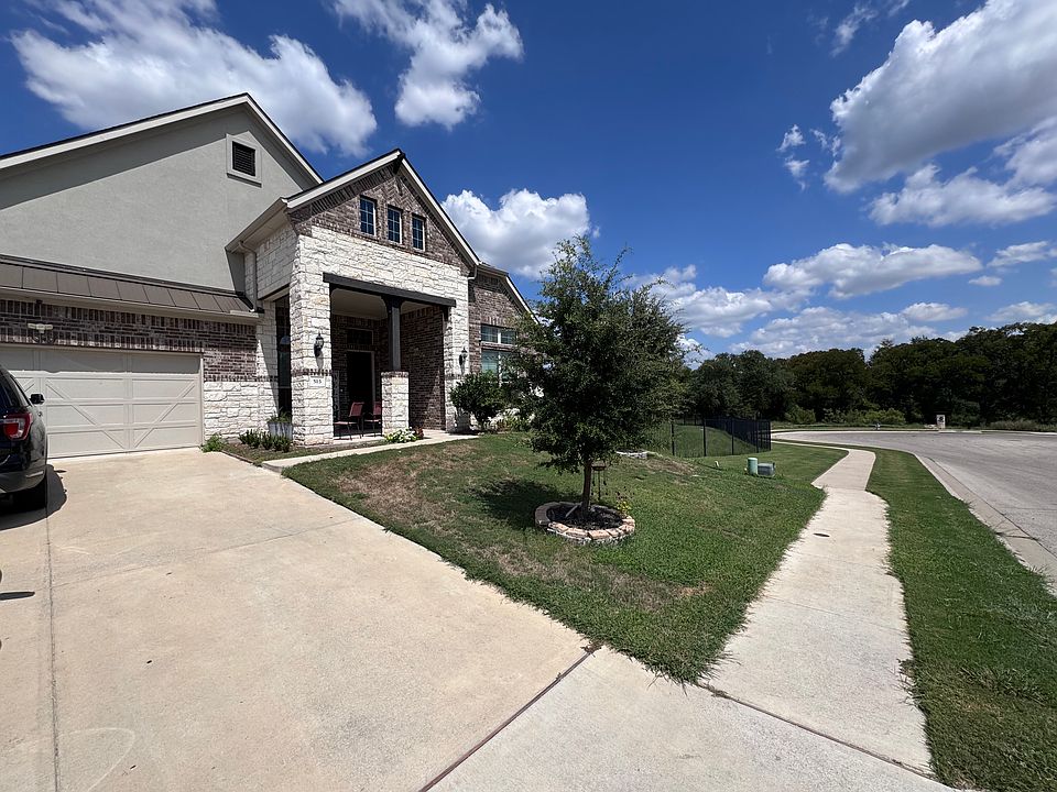 Front view of home - by the green belt.