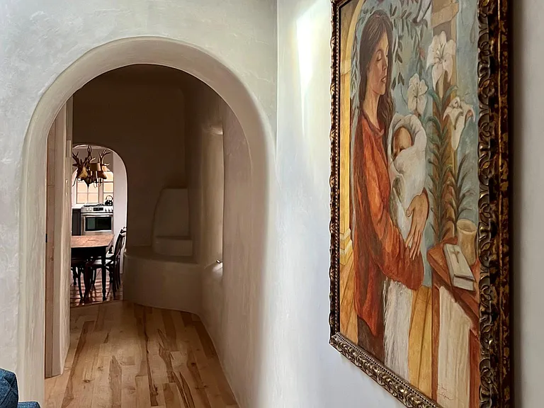 Hall from living room to bedroom, dining room and kitchen.