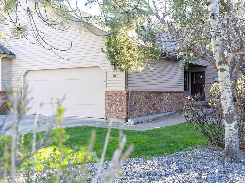 Street view of entry and garage