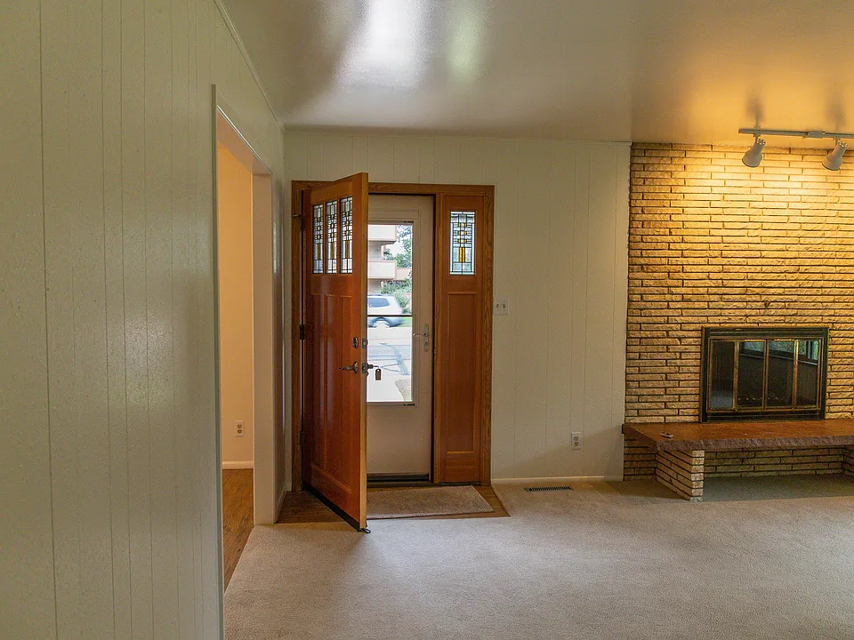 Beautiful front door and fireplace
