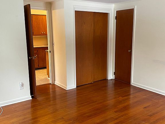 View from the back of the bedroom looking towards the closets.