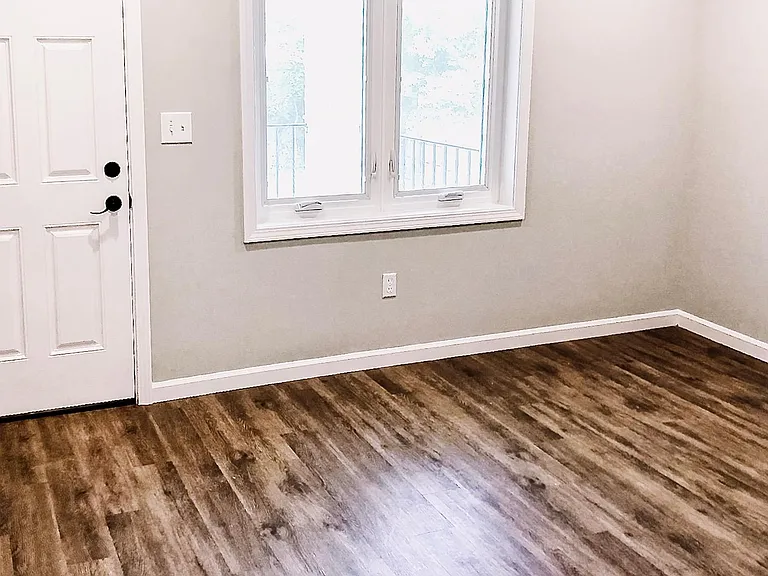 (Unit #2|1-Bed/1-Bath|Second Floor): Living Room with Balcony Access