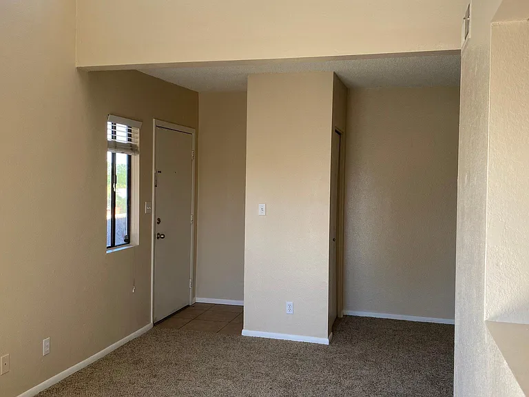 high ceiling in the living room. lot of natural light and cooler in the summer