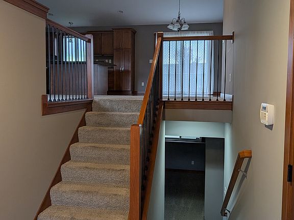 Split level entry with coat closet & access to 3-car garage