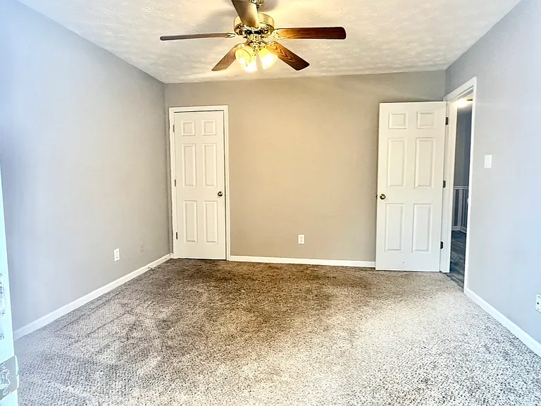 Living room with extra large storage closet 
Flooring has been changed to LVP