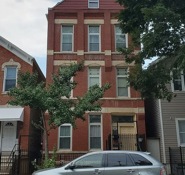 1626 S Throop St — Photo 1