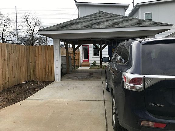 Two Car Parking Pad & Space For an Additional Two Cars in Th