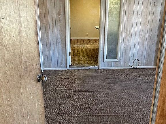 between garage and kitchen