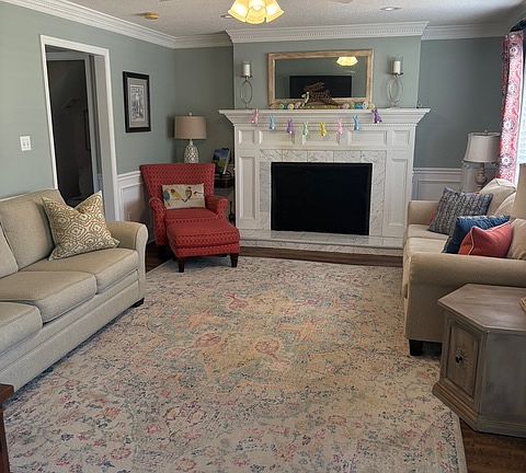 Living room with functining wood fireplace