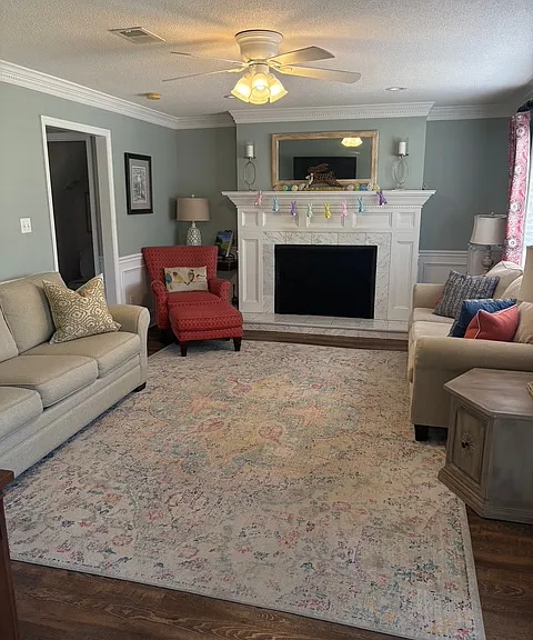 Living room with functining wood fireplace