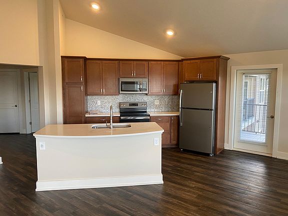 Kitchen *WILL HAVE CARPET THROUGHOUT AND VINYL IN WET AREAS*