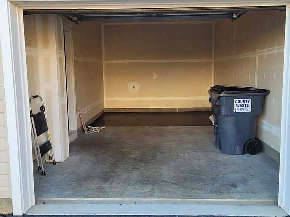 Single car garage with garage door opener