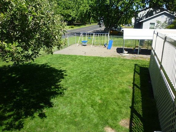 Large side yard with playground