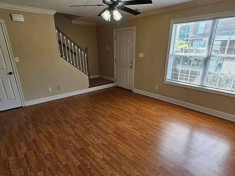 living room with ceiling fan