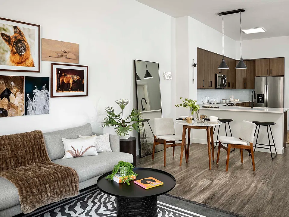 Griffis Cherry Creek North apartment living room with wood style floor.