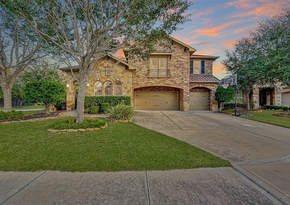 Picturesque curb appeal! This subdivision lot has an oversized driveway including a 3 car garage.