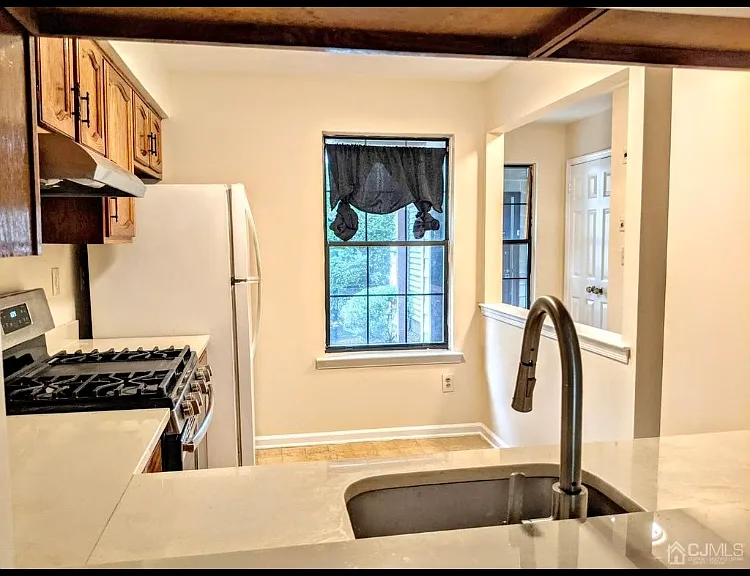 106 Woodbridge Commons Way #106 — Photo 1