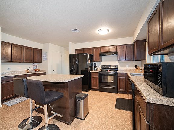 5th image of 7096 E 37th Pl