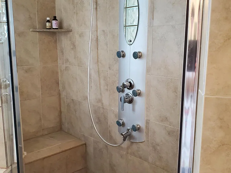 bathrooms have shower towers