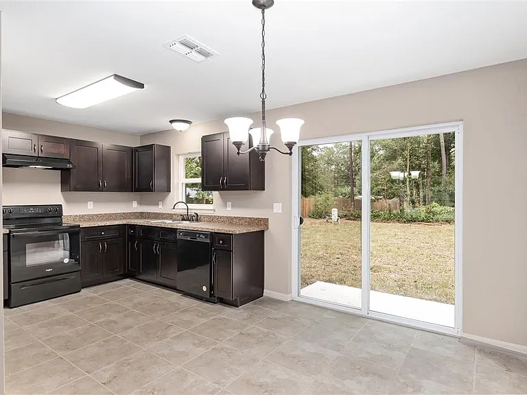5587 NW 62nd Ave — Photo 8