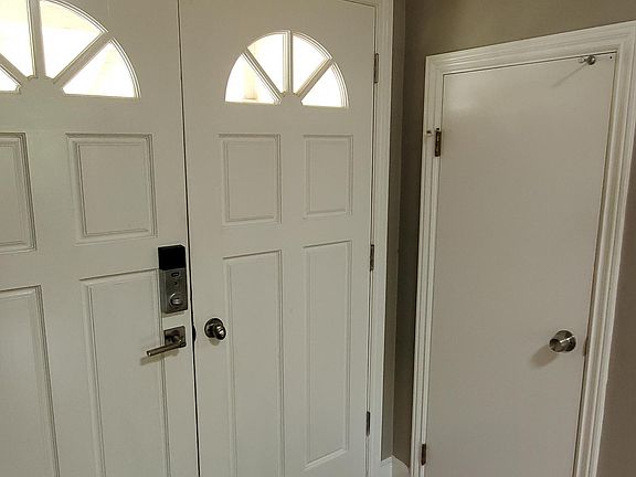 Double door entrance with sun-light