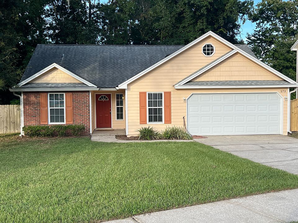 3/2 with 2-car garage & fenced yard