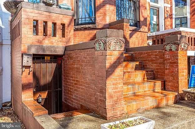 Entrance to apartment with gaited entry and locked small storage area for bikes, etc