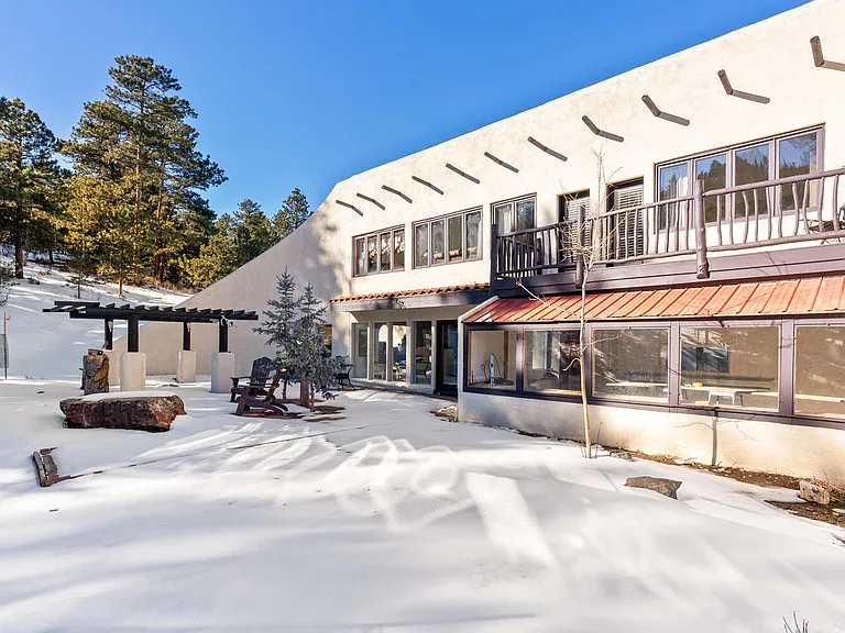 Large private side yard and view of master bedroom balcony