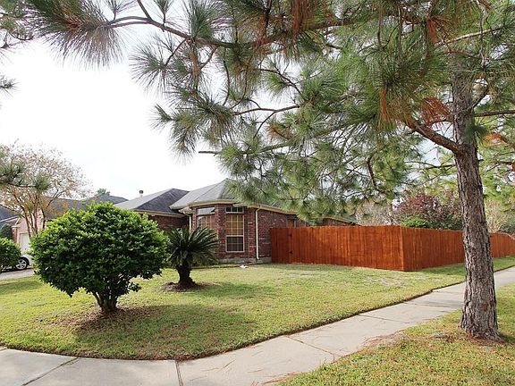 ON A CORNER LOT. NO NEIGHBOR AT BACK - BACKS TO A SMALL PARK.