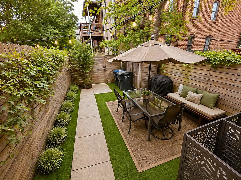 Backyard, shared with upper unit (4 Howard University women)