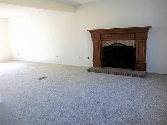 Living/family room with wood burning fireplace