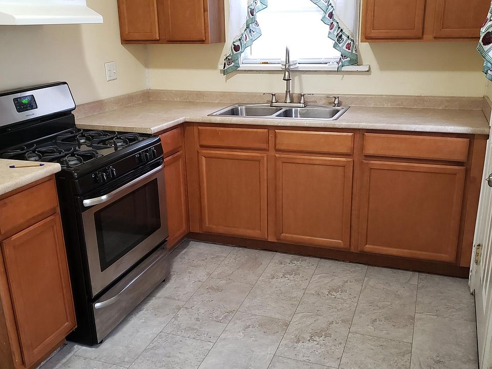Kitchen with new stove and floor