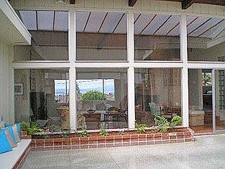 Retractable glass roof