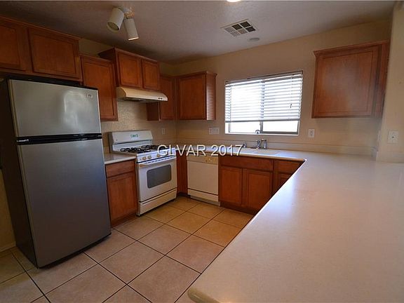5th image of 9038 Mackanos Ave
