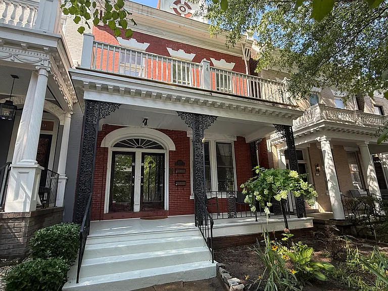 Historic Fan Apartment (upstairs unit) with established landscaping and upper porch for relaxing in the evenings.