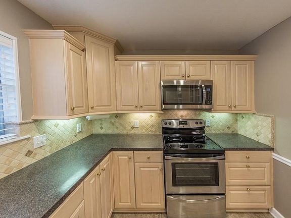 Look at all of that counter space! Microwave, Range, and Dishwasher replaced Feb  17.