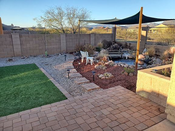 Extended paver patio to pond