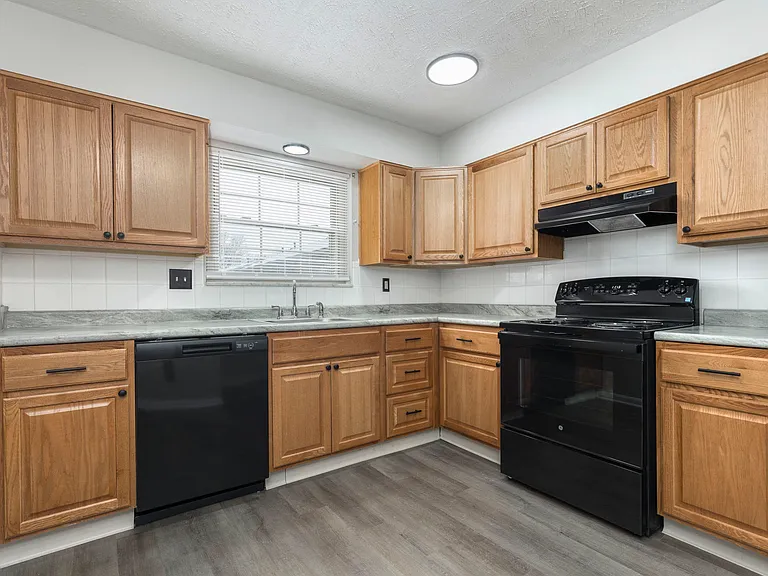Modern upgrades- New Black appliances package, New LVP flooring