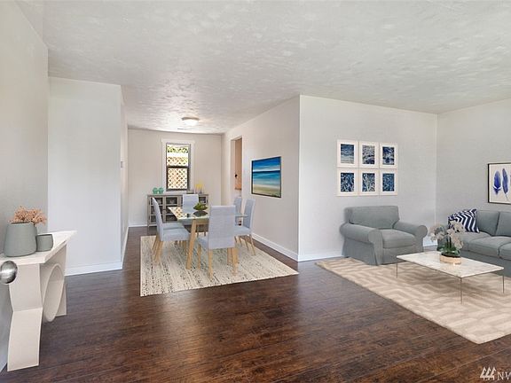 living and dinning space. room has been virtually staged