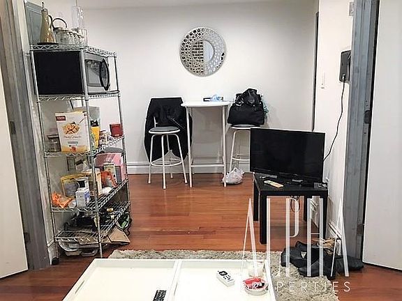 3rd image of 150 E 3rd St APT 4D