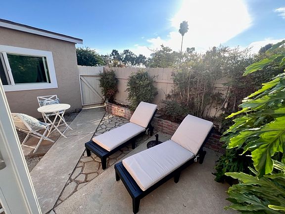 Private Enclosed Patio Accessible from Living Room and Exterior. Windows to Kitchen and Bedroom