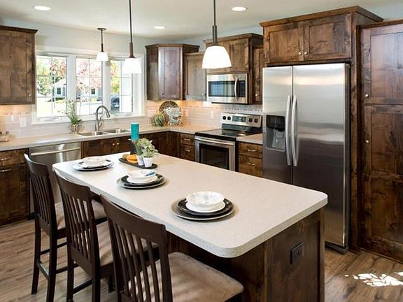 Stainless Steel Appliances, Subway Tile Back Splash, Large Windows for Natural Light