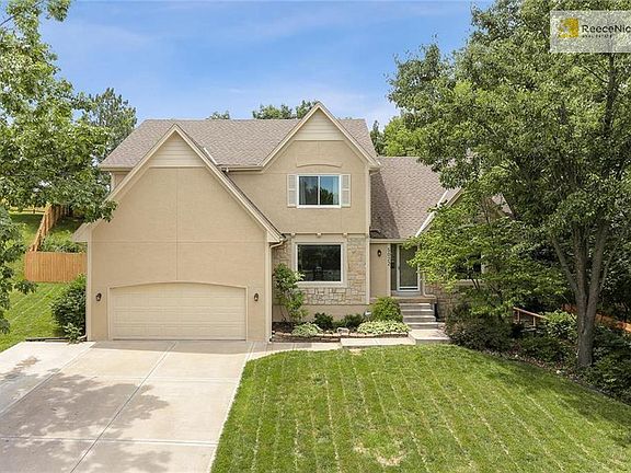 STUCCO AND STONE EXTERIOR.  DRIVEWAY EXPANDED TO PARK ADDITIONAL CARS