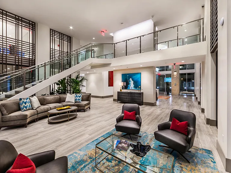 Elegant lobby lounge with coworking areas and art from acclaimed artists.