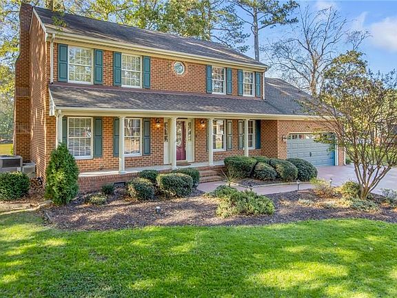 Stunning all brick home in sought after Jolliff Woods